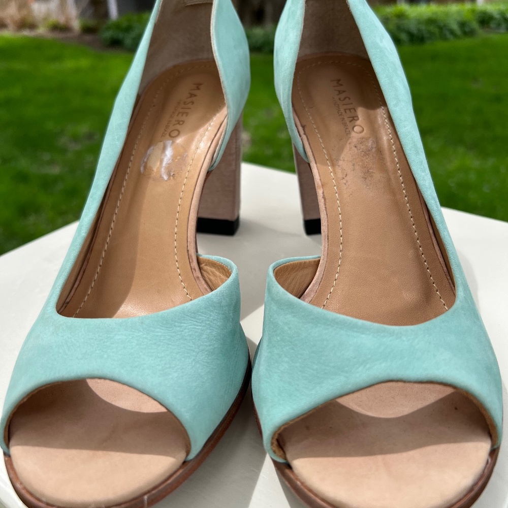 Size 10  Mastero 4” peep toe cutout heels.  Made in Brazil